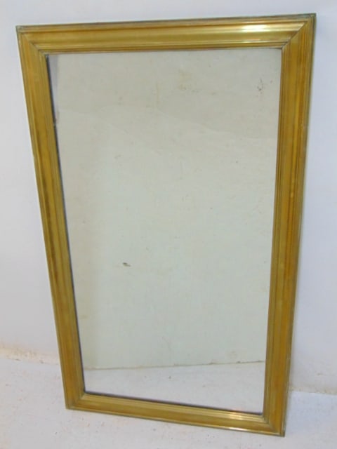 Brass framed mirror, wood paneled back, 47" by 28" (1 of 4)