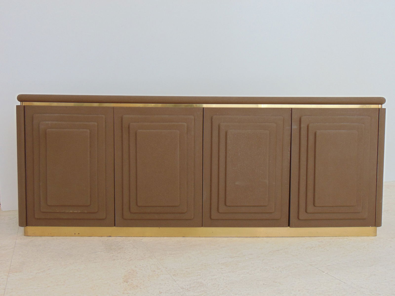 Karl Springer style grass cloth and brass trim credenza, Mid Century design, 4 doors with tiered (1 of 7)