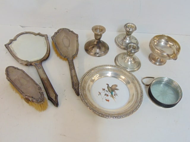 Sterling lot, vanity mirror & brushes, candle holders, coasters, weighted (1 of 4)
