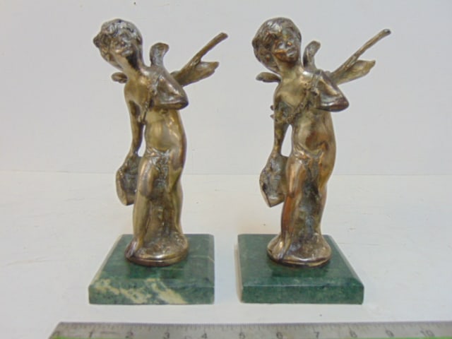 Pair silvered bronze winged putti figures on green marble bases, height is 8.5": Pair silvered bronze winged putti figures on green marble bases, height is 8.5"