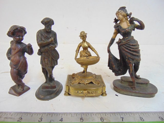 4 small bronzes, figural match holder with small drawer, bronze putti, early bronze of a man with (1 of 7)