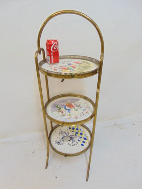 Brass muffineer with 3 decorated round shelves, height stand is 39": Brass muffineer with 3 decorated round shelves, height stand is 39"