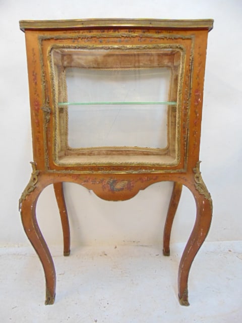Small paint decorated vitrine with bronze trim, beveled glass, vitrine is 22.25" wide, 15" deep, (1 of 5)