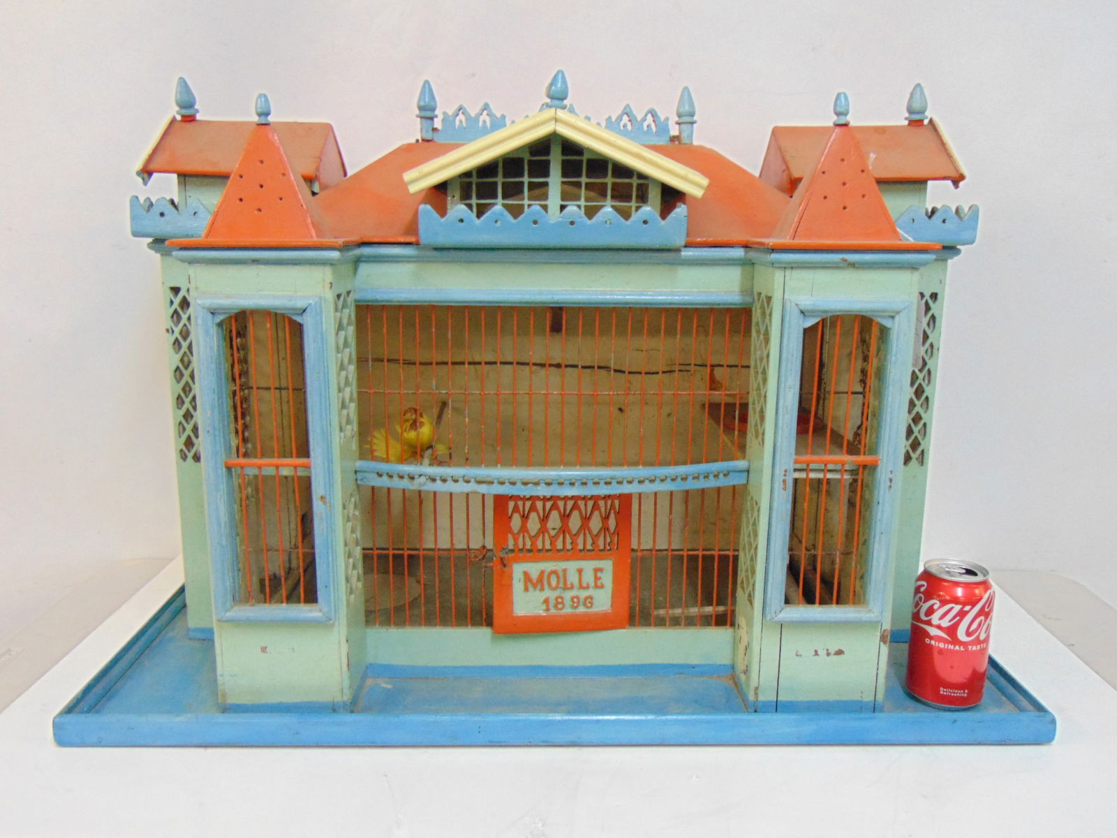 Decorative metal & wood bird cage, in blue, green & red paint, "Molle, 1896", base is 33" by 16", (1 of 5)
