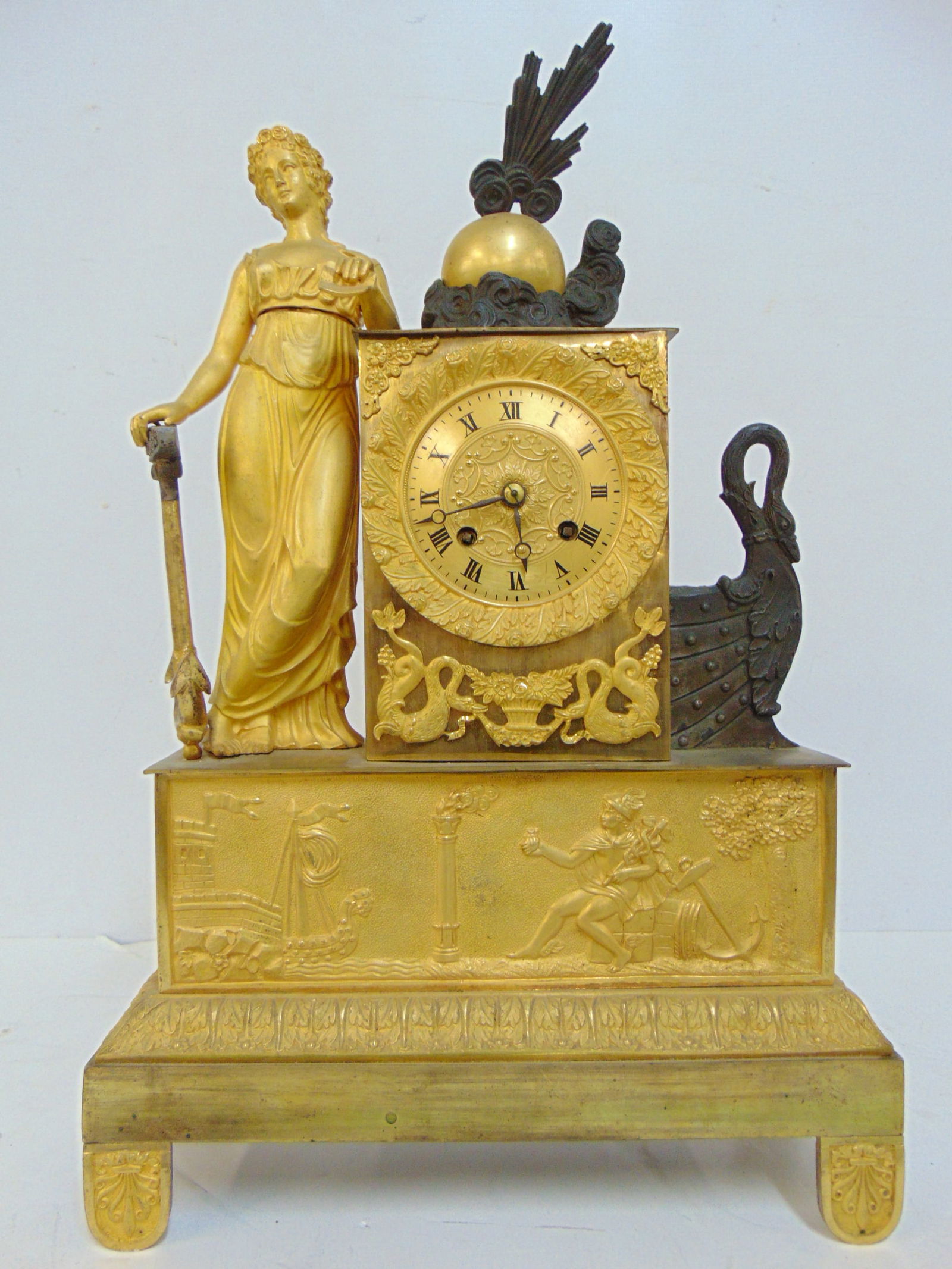 Bronze figural clock, gilt patina, figure of a lady leaning on an anchor & swan, height is 17.5" (1 of 8)