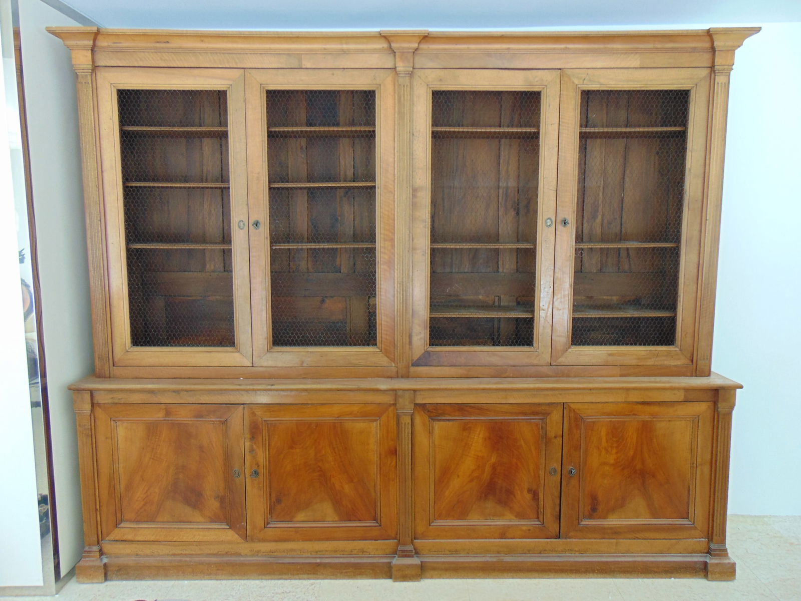 Large English bleached mahogany George II bookcase, cabinet, breakfront is 9 feet long, 19.25" deep, (1 of 6)