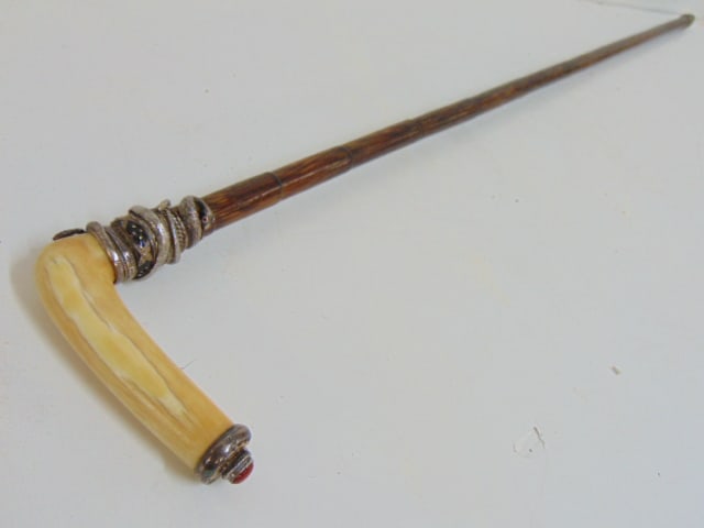 Bone handle walking cane with silver snake decorated collar, & jewel in handle, cane is 34.5": Bone handle walking cane with silver snake decorated collar, & jewel in handle, cane is 34.5"