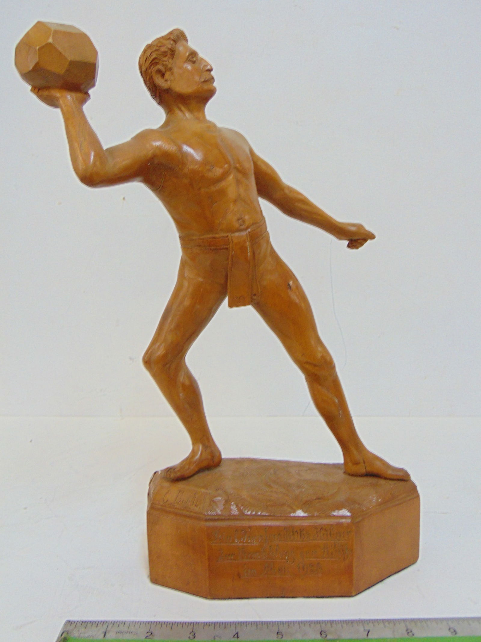 Carved wood Shot Put figure by C. Burch (?) with German writing on base, see images, height is (1 of 6)