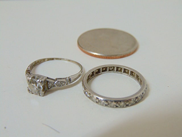 Jewelry. Vintage platinum Diamond wedding set center stone approx. 5mm flanked by two inset diamonds (1 of 4)