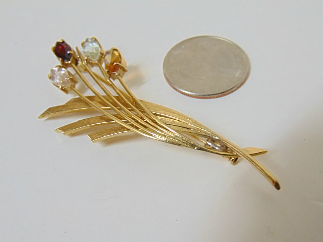 Jewelry. 18kt yellow gold pin w/ gemstones, 12.10 grams, four prong set gemstones, 3" length, (1 of 5)