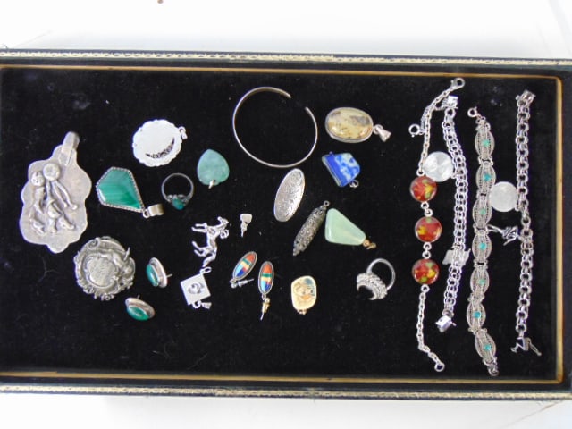 Jewelry. Collection of sterling & other to include sterling charm bracelets; sterling cuff; earrings (1 of 5)