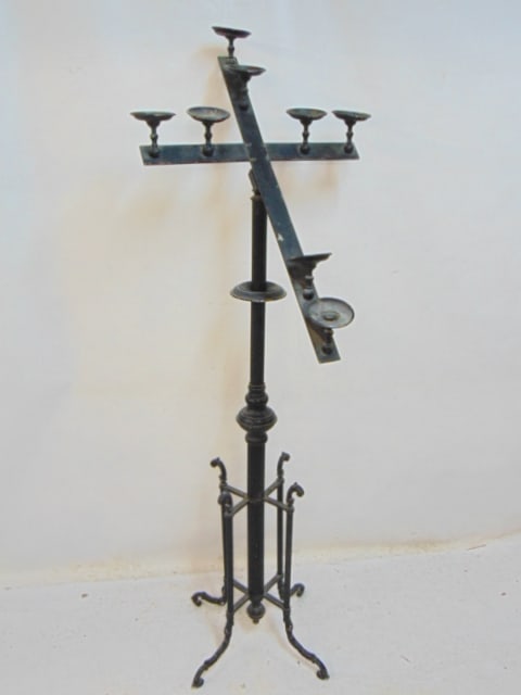 Iron church floor candelabra with angled top, height is 69.5": Iron church floor candelabra with angled top, height is 69.5"