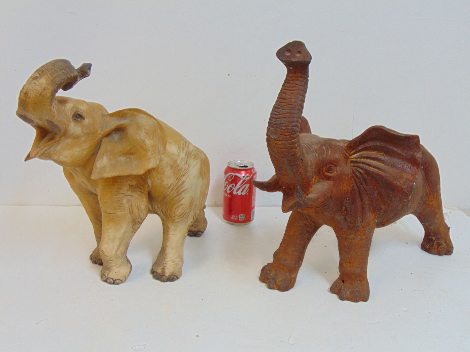 2 elephants, Guido Cacciapuoti ceramic elephant, Italy & iron elephant, unmarked, rusted patina.: 2 elephants, Guido Cacciapuoti ceramic elephant, Italy & iron elephant, unmarked, rusted patina.