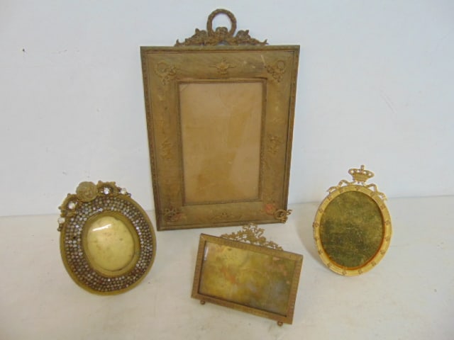 4 brass frames, one with jewels, largest frame is leather with brass trim and has 5.25" by 8" (1 of 5)