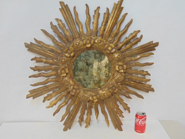 Gilt & carved wood sunburst mirror, several "rays" are loose, diameter is 32.75", label, "Made in (1 of 5)