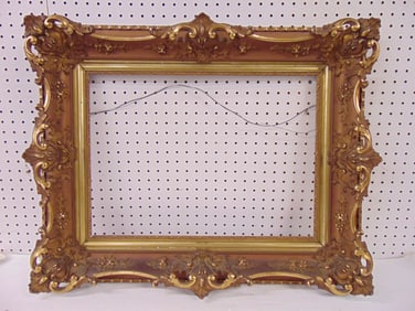Ornate gilt frame, carved & gilt gesso & wood, opening is 15.75" by 21.75"