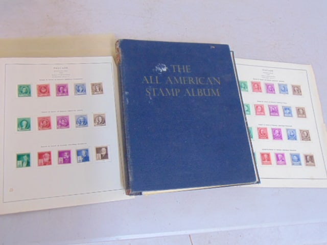 Stamp album with mint, uncirculated stamps, "The All American Stamp Album", many stamps includes (1 of 9)