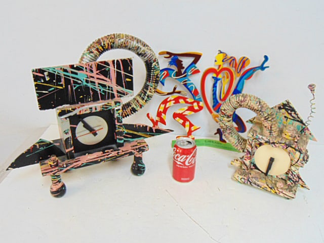 2 Memphis style splatter painted clocks, one signed R. Birkett, 1986, NYC & steel "Gestein design" (1 of 8)