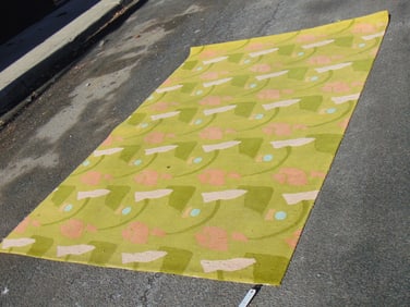 Mid Century carpet, "Cold Picnic" in green with white & pink shapes, 9'10" by 6"