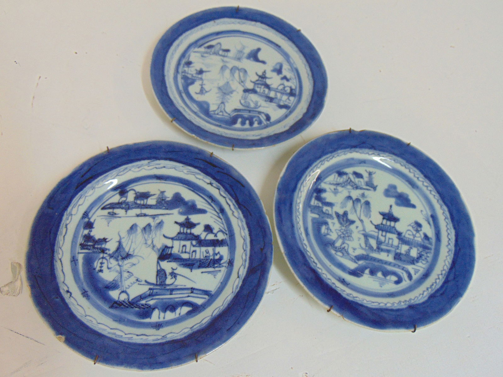 3 blue & white Chinese Canton plates, various temple designs, 2 plates have chips, 9.5" & 10" in