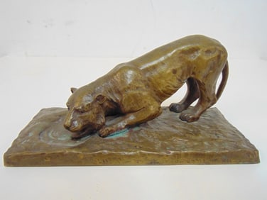 Small bronze lion figure, signed Martin, lion drinking, base is 7" by 3.25", height is 3"