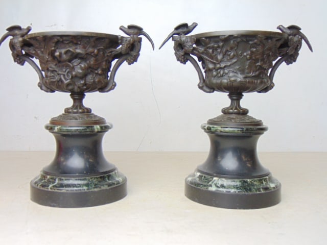Pair bronze garnitures, urns on marble bases, decorated with grapes, vines and birds seated on rim, (1 of 5)