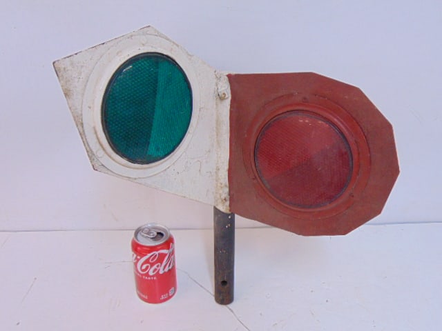 Railroad sign post with red & green reflectors, painted white & red, 14.25" center post, about 2o": Railroad sign post with red & green reflectors, painted white & red, 14.25" center post, about 2o" deep & wide, irregular shaped, one red reflector is cracked