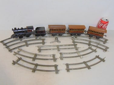 Bing toy train set with wind up locomotive, 3 cars & track, in working condition, key included