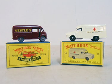 Two matchbox series Lesney cars in original box, No 14 Lomas Ambulance & No 69 Nestle's Van, cars &