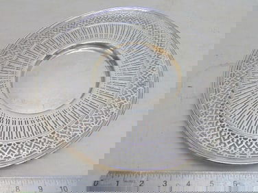 Tiffany & Co makers sterling silver plate with reticulated edge, diameter is 10 5/8", 12.5 troy