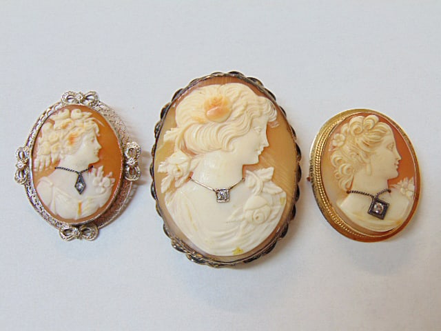 Jewelry. 3 Vintage Cameo pins/brooch each w/ diamond chip necklace. 14kt yellow gold carved cameo,: Jewelry. 3 Vintage Cameo pins/brooch each w/ diamond chip necklace. 14kt yellow gold carved cameo, 6.40 grams, approx. 2.5mm x 3mm; 14kt white gold filigree, 5.90 grams, approx. 3 mm x 3.5mm total mea