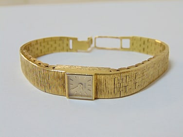 Jewelry. Vintage 18kt Piaget ladies wristwatch, brush gold band, 38.20 grams, hallmark # 1001 A 6,