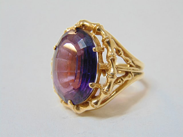 Jewelry. Vintage 14kt yellow gold cocktail ring w/ large faceted oval purple stone 2mm X 1.5mm, (1 of 4)
