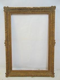 Large gilt wood & gesso frame, opening is 45,75" by 30", some chips, loss