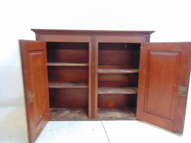 2 door country hanging cupboard, in mahogany, cabinet is 43.75" wide, 11 5/8" deep, height is 35"