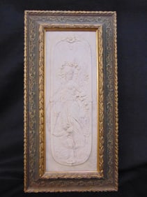 Carved marble relief plaque, winged angel & putti, in carved frame, with bronze medallion on