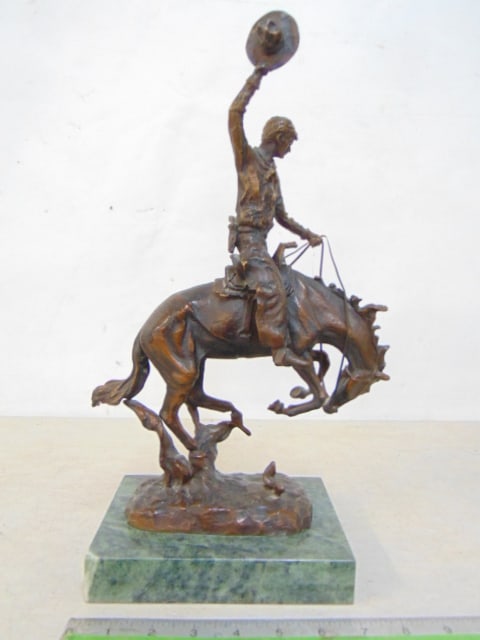 Bronze figure, cowboy on horse after Carl Kauba, rodeo cowboy, on green marble base, 15.5" tall, (1 of 5)
