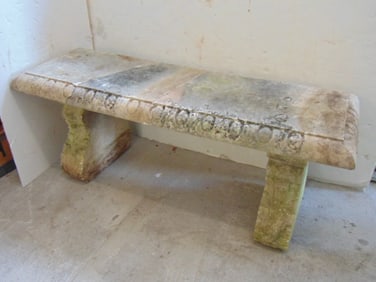 Carved marble bench, seat is broken, and is laying on steel plate, seat is 47" by 15.75", height is