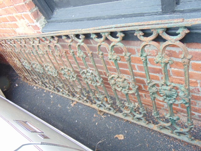 Two sections of cast iron fence, top rail on both is rusted, loose, smaller section has several (1 of 7)