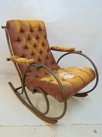 Tubular brass rocking chair attributed to Lee Woodard, tufted upholstery, wood rocker panels, worn,