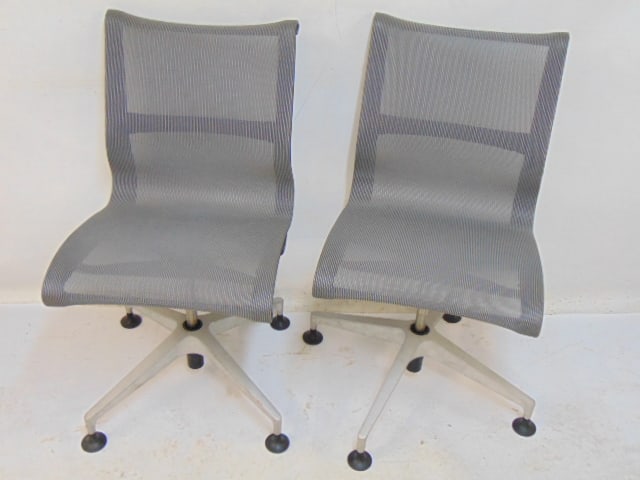 Pair Herman Miller mesh swivel chairs, chairs are 18.5" wide, 22" deep, height is 36": Pair Herman Miller mesh swivel chairs, chairs are 18.5" wide, 22" deep, height is 36"