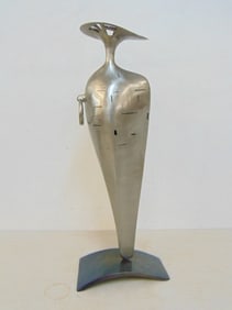 Steel sculpture by Donal Molloy-Drum, "Mineira", sits loose on base, height is 23.25"