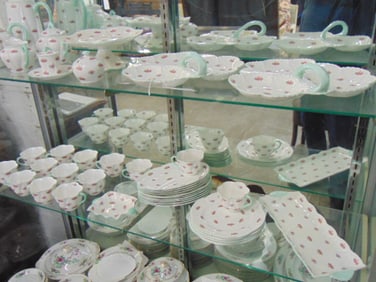 Large set of Shelley fine bone china, "Rosebud" pattern, includes 10 cups with oval saucer plates, 4