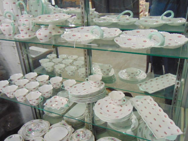 Large set of Shelley fine bone china, "Rosebud" pattern, includes 10 cups with oval saucer plates, 4: Large set of Shelley fine bone china, "Rosebud" pattern, includes 10 cups with oval saucer plates, 4 cups with round saucer plates, 3 triple bowls with handles, tea & coffee pot, sugar & creamer, foot