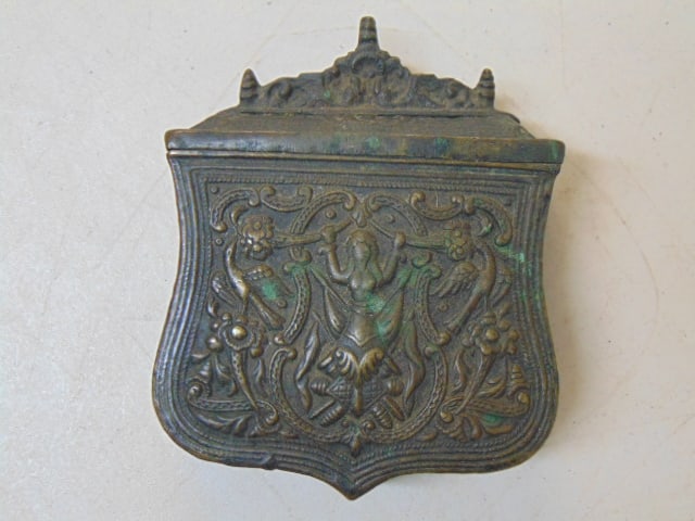 Brass Ottoman cartridge box, extensively decorated, with belt hook on back, 5" tall, 4" wide, 1.25": Brass Ottoman cartridge box, extensively decorated, with belt hook on back, 5" tall, 4" wide, 1.25" deep.