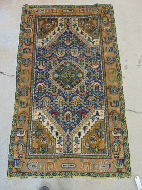 Scatter rug, center medallion, in blue, brown border, carpet is 75" by 44" (1 of 4)
