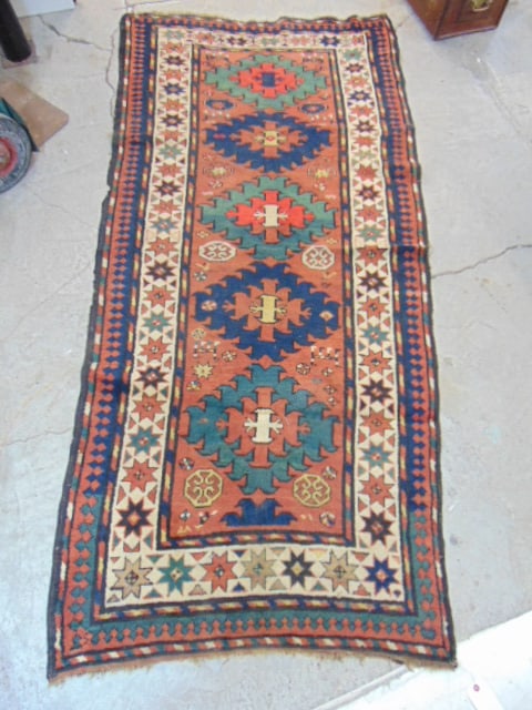 Persian carpet, with 5 diamonds, in brown, carpet is 89" long, width varies from 38" to 44": Persian carpet, with 5 diamonds, in brown, carpet is 89" long, width varies from 38" to 44"