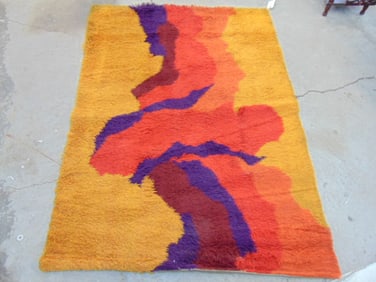 Mid Century shag rug in orange, red & purple, carpet is 74" by 53",