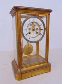 Crystal regulator with pendulum, beveled glass, clock is 7 7/8" by 5 7/8", height is 12 3/8",