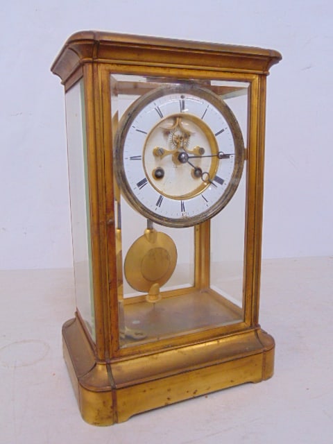 Crystal regulator with pendulum, beveled glass, clock is 7 7/8" by 5 7/8", height is 12 3/8", (1 of 4)